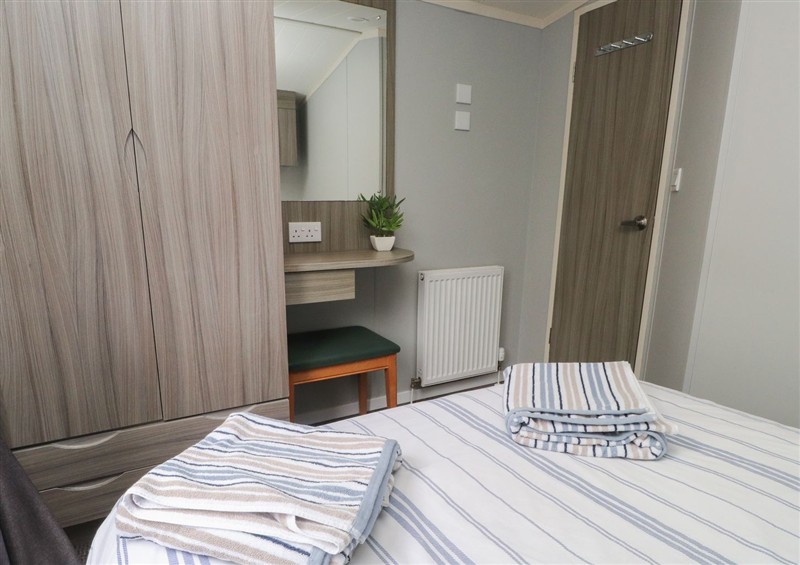 A bedroom in Caravan (photo 2) at Caravan, Llangefni