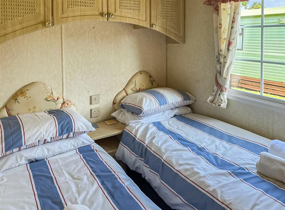 Twin bedroom at Caravan Two in Oakford, near Llanarth, Dyfed