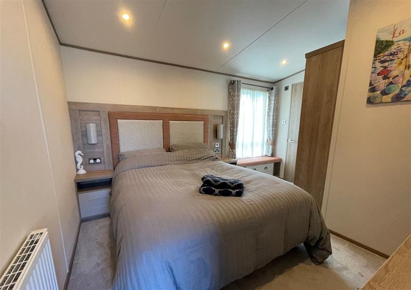 A bedroom in Caravan at Caravan, Waldegraves Holiday Park near Mersea Island
