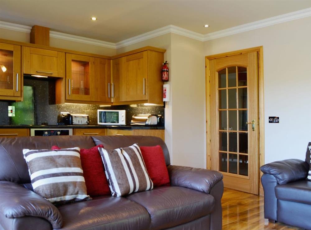 Open plan living/dining room/kitchen (photo 4) at Carinish Beag in Fort William, Inverness-Shire