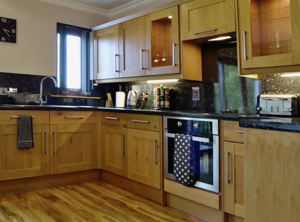 Open plan living/dining room/kitchen (photo 5) at Carinish Beag in Fort William, Inverness-Shire