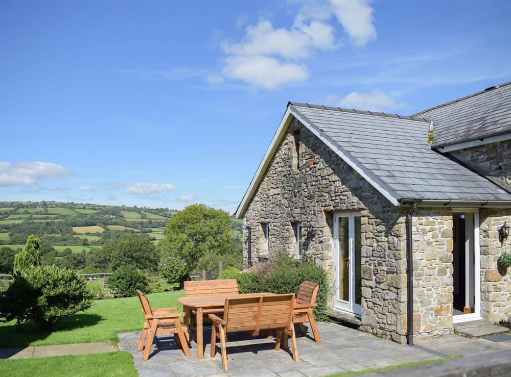Beautiful patio with extensive widespread views at Carmarthen Cottages- Barn Cottage in Cwmdu, near Carmarthen, Dyfed