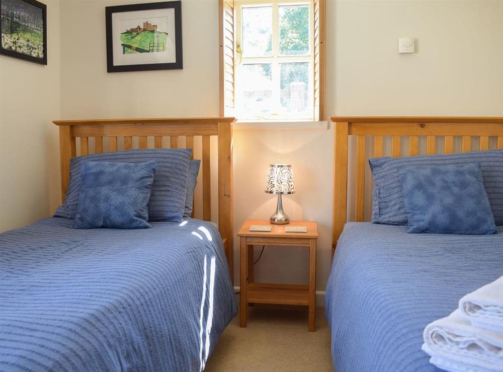 Light and airy bedroom with twin single beds at Carmarthen Cottages- Barn Cottage in Cwmdu, near Carmarthen, Dyfed