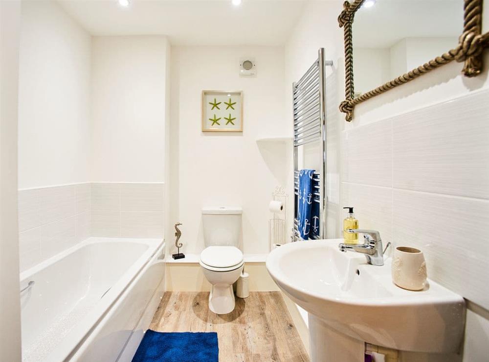 Family bathroom with heated towel rail at Carmel in Beadnell, near Seahouses, Northumberland