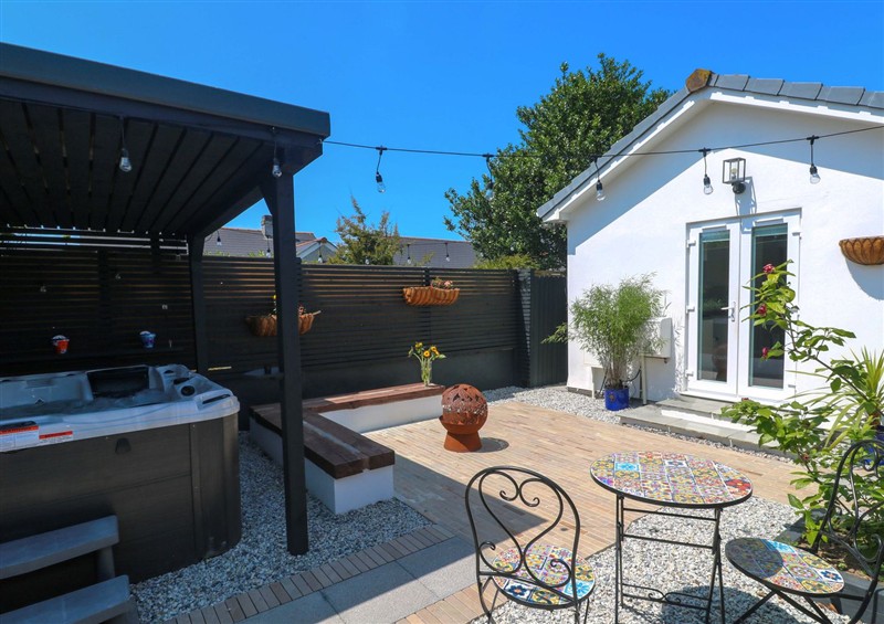 Enjoy a glass of wine on the patio at Carn Brea, Redruth