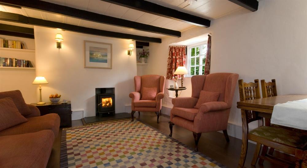 The sitting and dining room at Carne Cottage in Helston, Cornwall