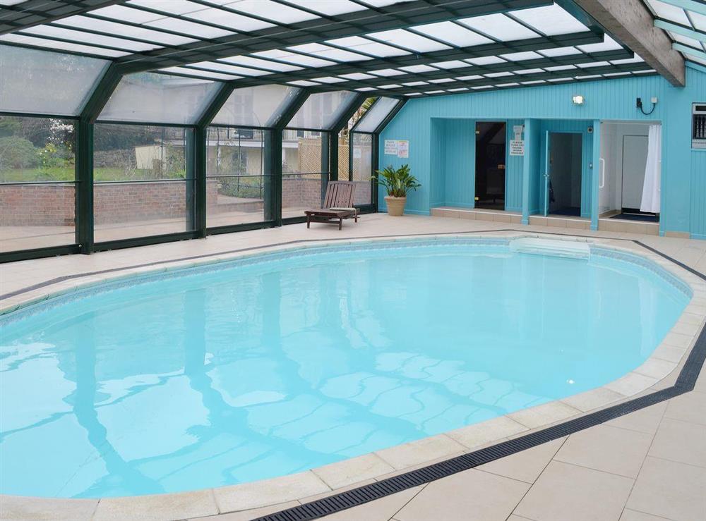 Shared use of a heated 15m swimming pool which has a retractable glass roof, which can be opened to enjoy the sun or closed to maintain a perfect environment to enjoy the warm water of the pool at One Acre View, 