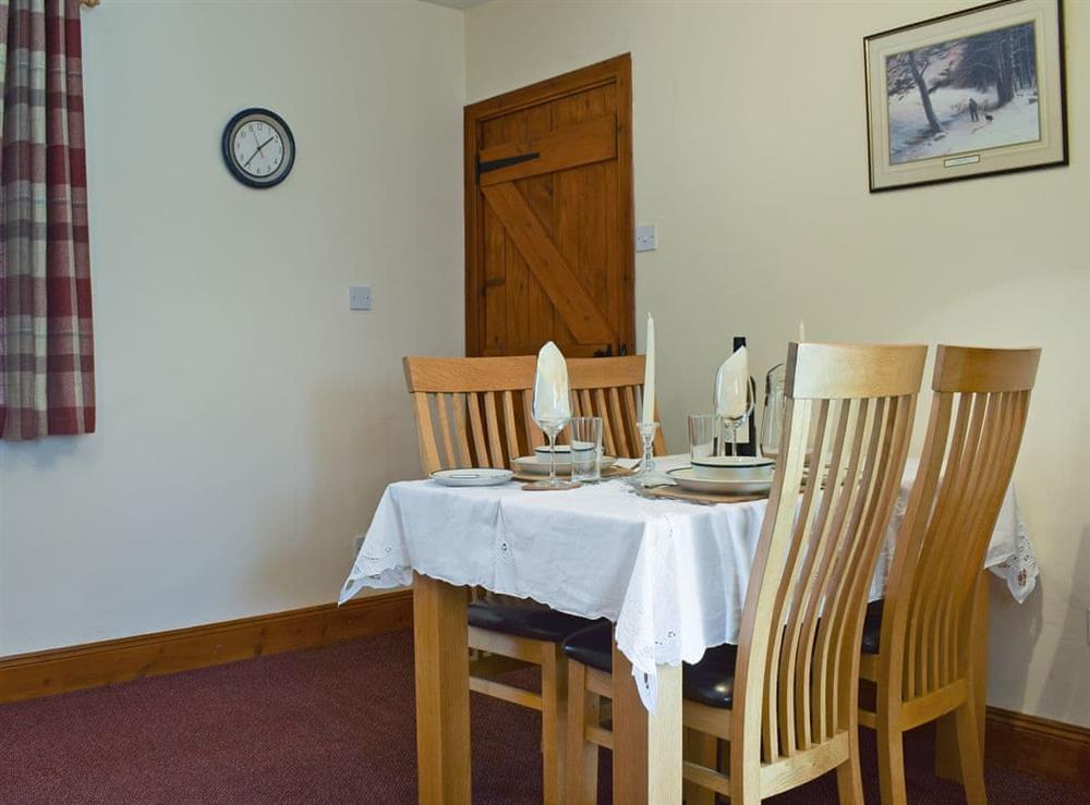 Attractive dining area at Caroch Cottage in Comrie, near Crieff, Perthshire