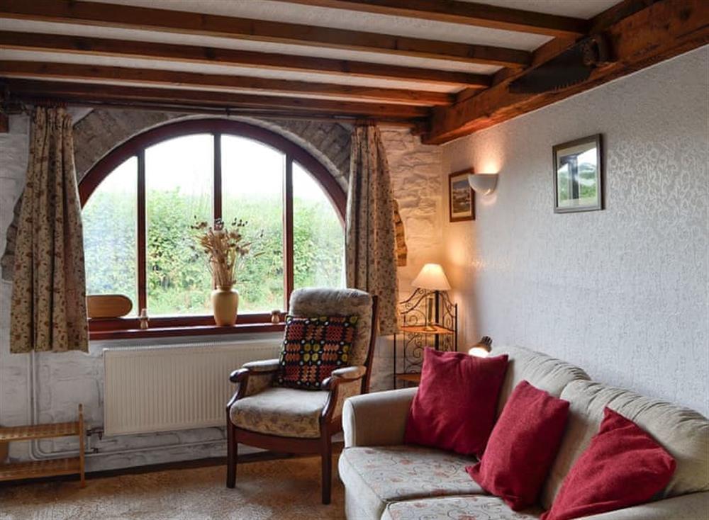 Living room at Carpenters Cottage in Libanus, near Brecon, Powys