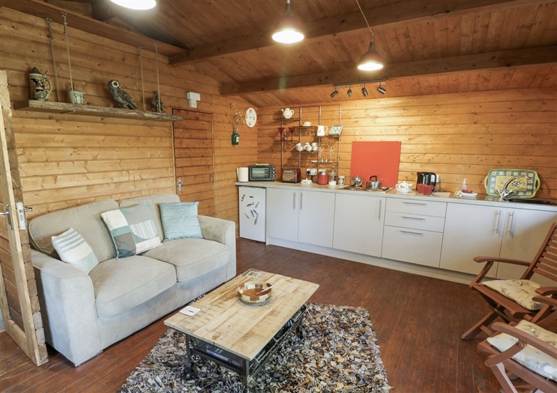 Enjoy the living room at Carps Well Lodge, Hatton near Shrewley