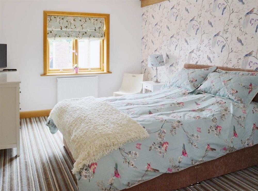 Pretty and romantic double bedroom at Carr End Barn in Stalmine, near Poulton-le-Fylde, Lancashire