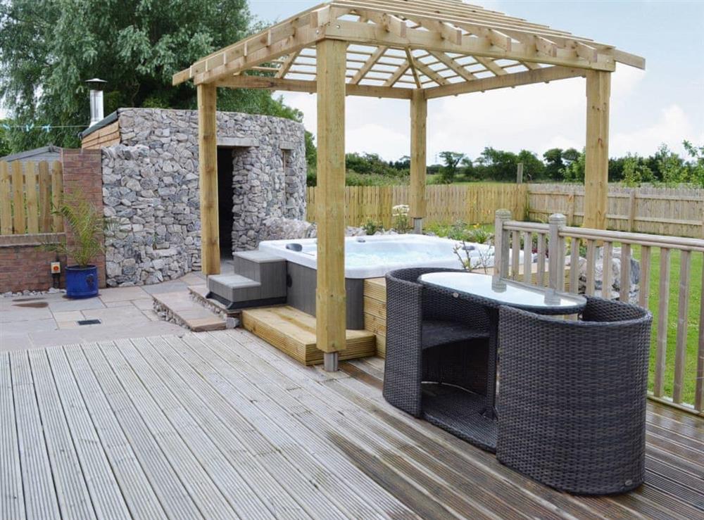 Relax in the luxurious hot tub at Carr End Barn in Stalmine, near Poulton-le-Fylde, Lancashire
