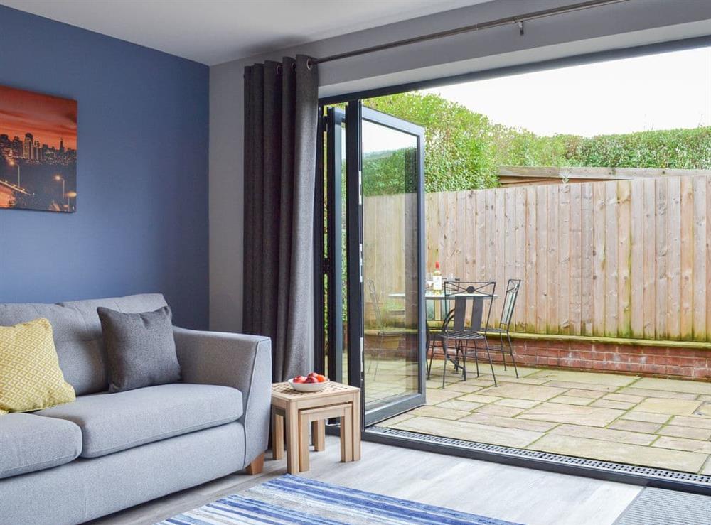 Lovely and bright living area with courtyard access at Carr Lodge in York, North Yorkshire