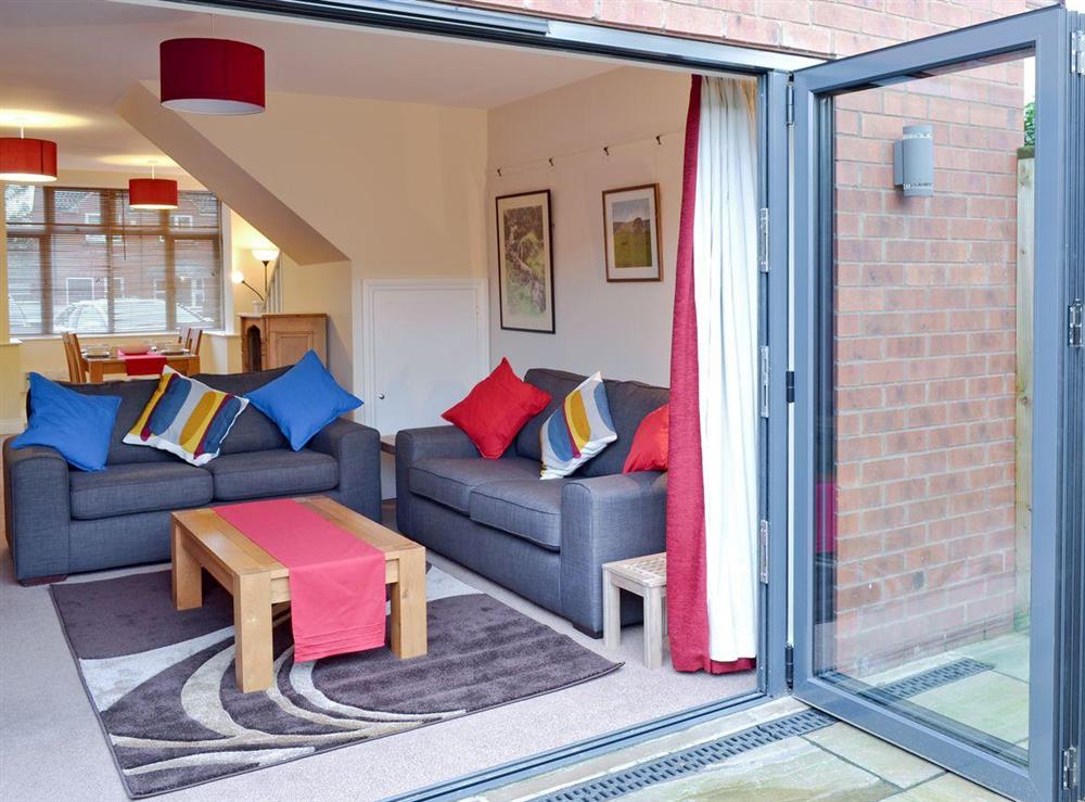 Modern folding doors to courtyard at Carr Lodge in York, North Yorkshire