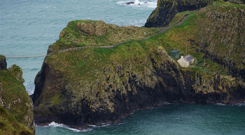 Carrick-a-Rede rope bridge and island, County Antrim at Carrick-a-rede Cottage in Ballycastle, County Antrim