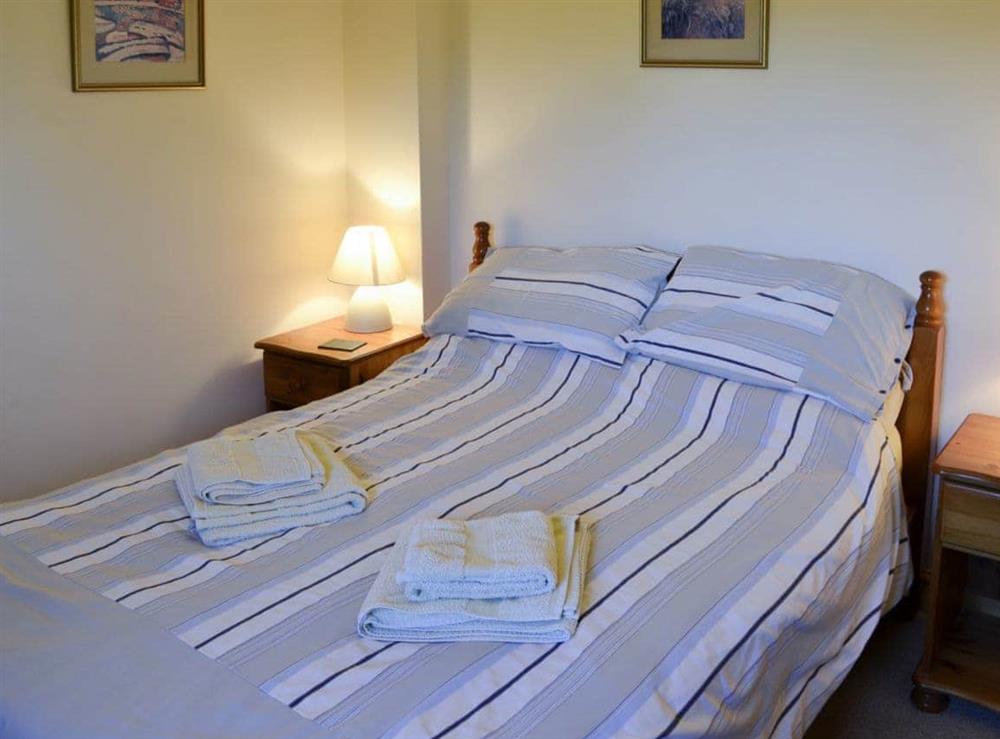 Warm and inviting double bedroom at Carters Cottage in Puncknowle, Dorchester., Dorset