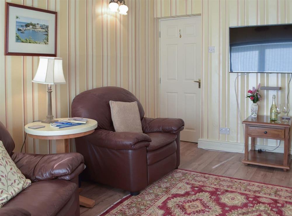 Living room with wood burner (photo 3) at Carthouse Cottage, Cosheston in Pembroke Dock, Dyfed