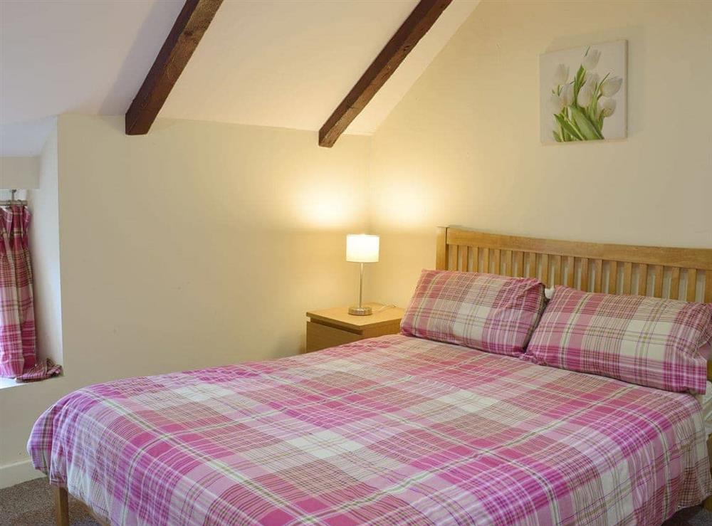 Comfortable double bedroom at Carthouse Cottage in Ivy Court Cottages, Llys-y-Fran, Dyfed