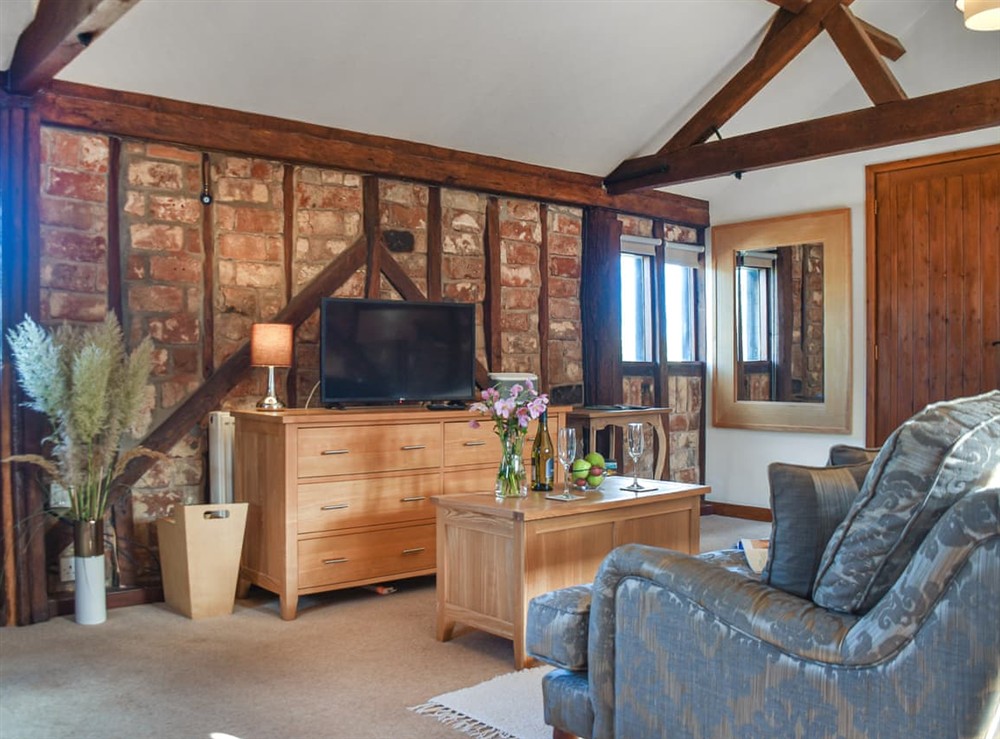 Living area at Cartlodge Loft in Palgrave, near Diss, Suffolk