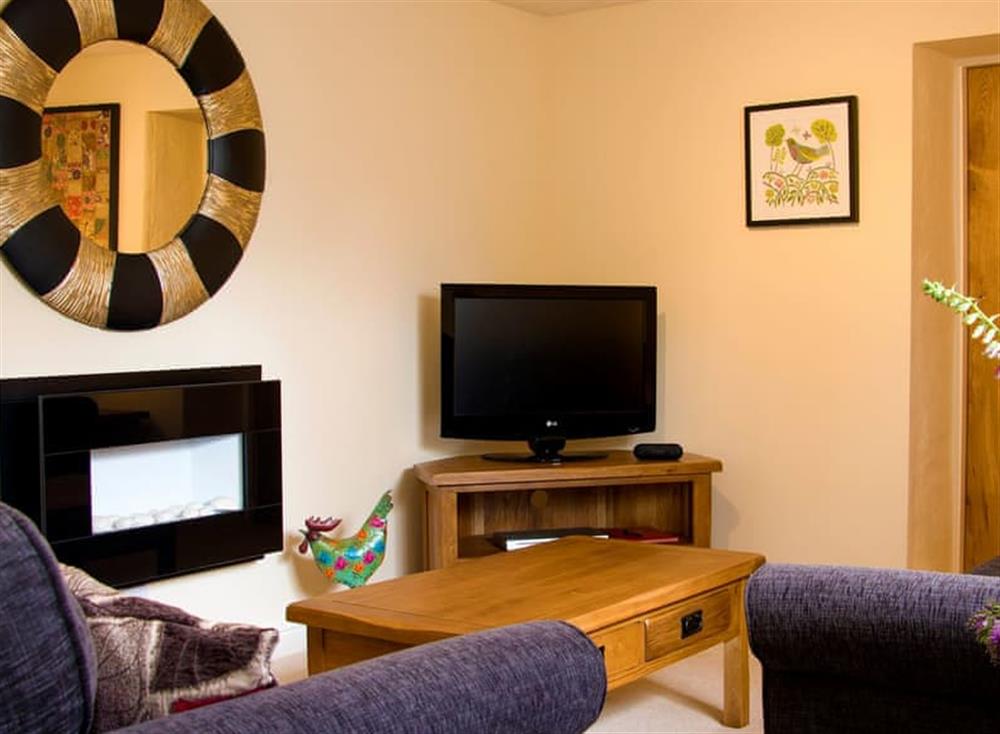 Comfortable living room at Caros Cottage, 