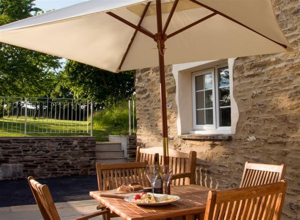 Patio with garden furniture and barbecue (photo 2) at Pennys Cottage, 