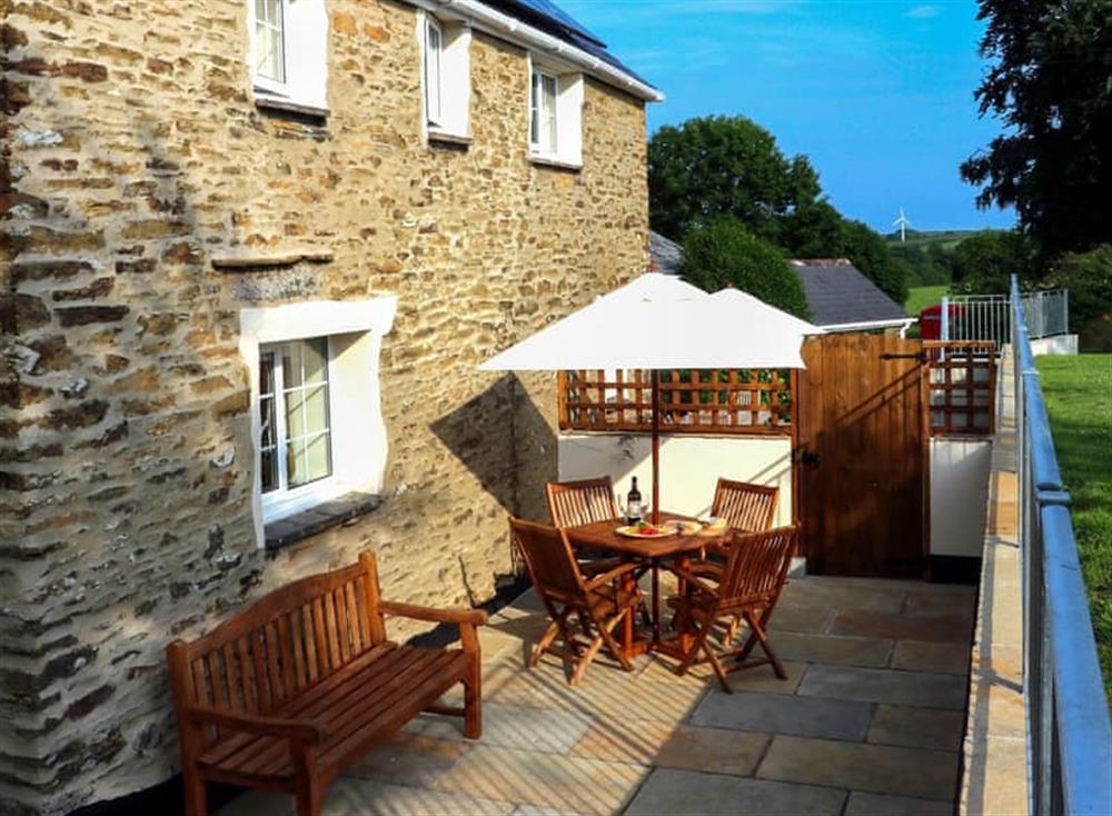 Patio with garden furniture and barbecue at Pennys Cottage, 