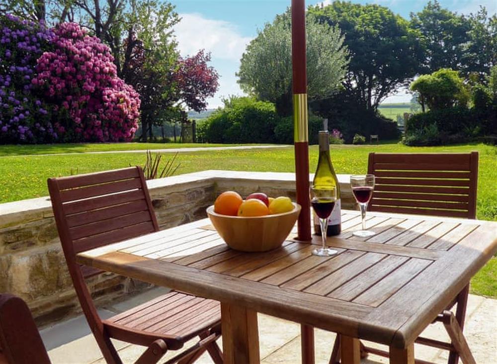 Patio with garden furniture and barbecue at The Linney, 