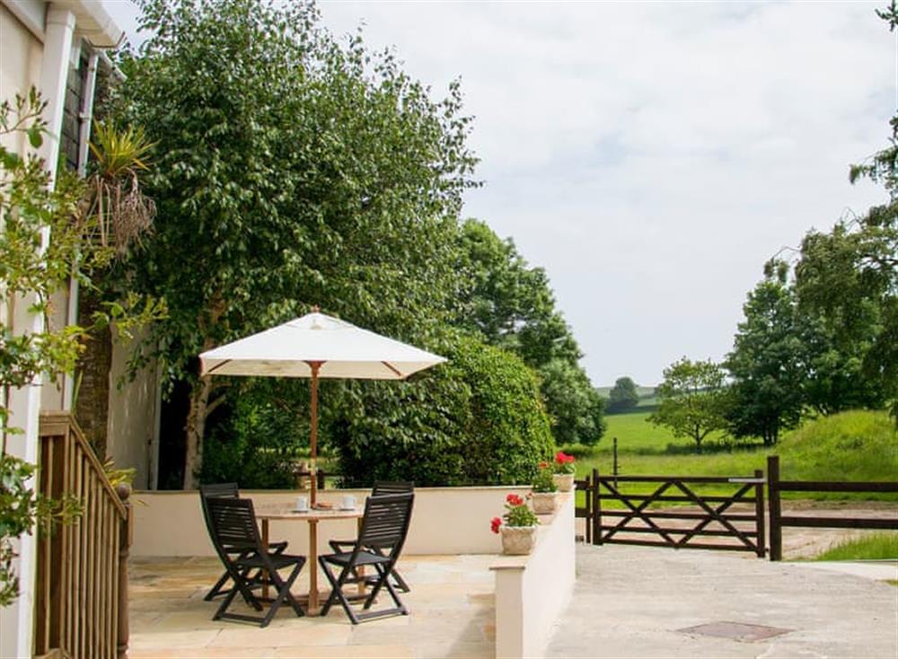 Patio with garden furniture and barbecue at The Shippen, 
