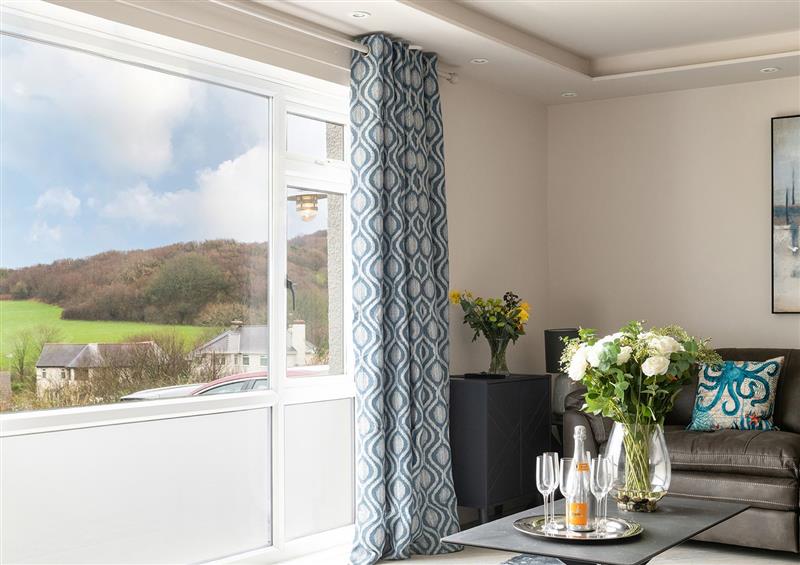 Relax in the living area at Cartref, Benllech