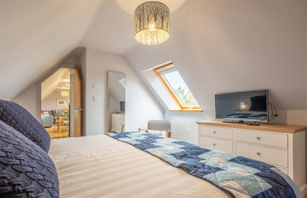 First floor: Bedroom with Smart television at Cartshed Lodge, Hoveton near Norwich