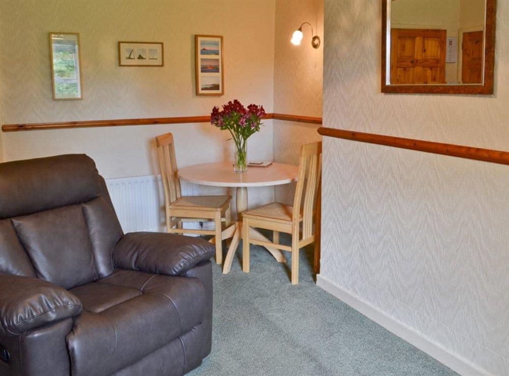 Quaint living/ dining room at Cartwheel Cottage in Longhorsley, near Rothbury, Northumberland