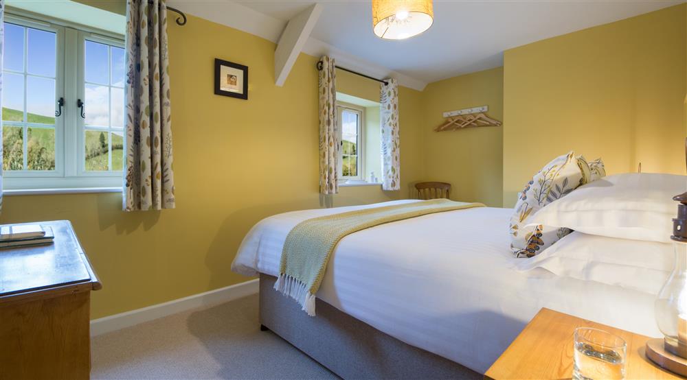 The first double bedroom at Carver Cottage in Oare, Devon
