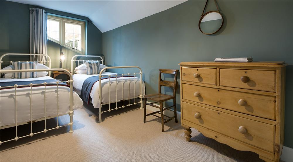 The twin bedroom at Carver Cottage in Oare, Devon
