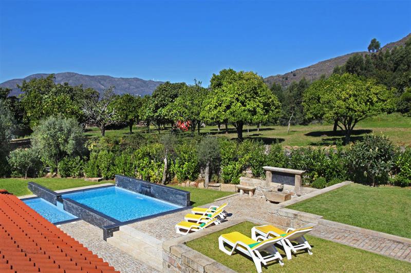 Swimming pool, garden and surroundings at Casa da Cuquinha, Ponte de Lima Area, Portugal