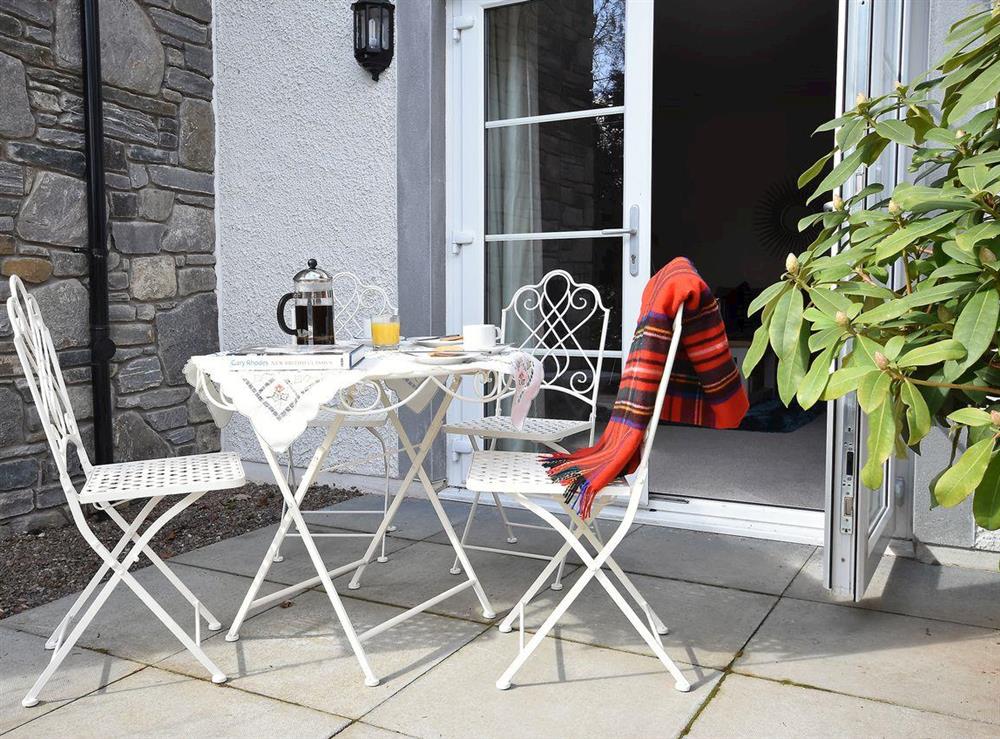 Pleasant outdoor area with patio and furniture at Casa Duran in Killin, Sterlingshire, Perthshire
