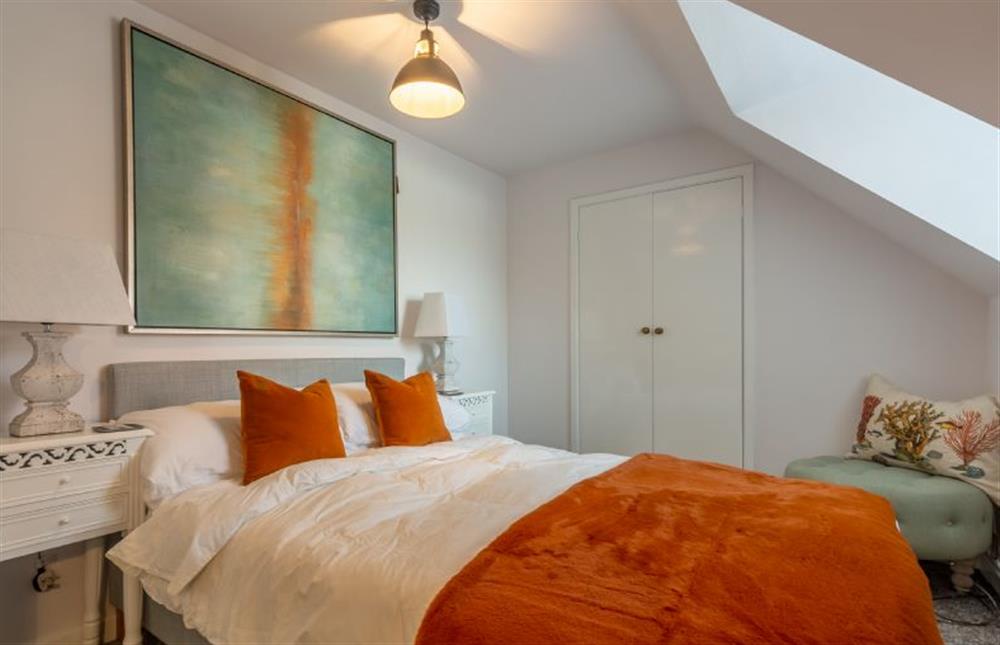 First floor: Bedroom two with king-size bed and wardrobe at Casamaria, Wells-next-the-Sea