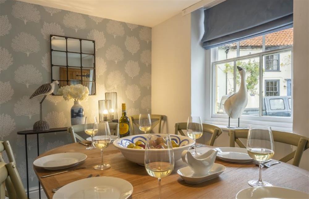 Ground Floor: Dining room with seating for seven with view of The Buttlands at Casamaria, Wells-next-the-Sea