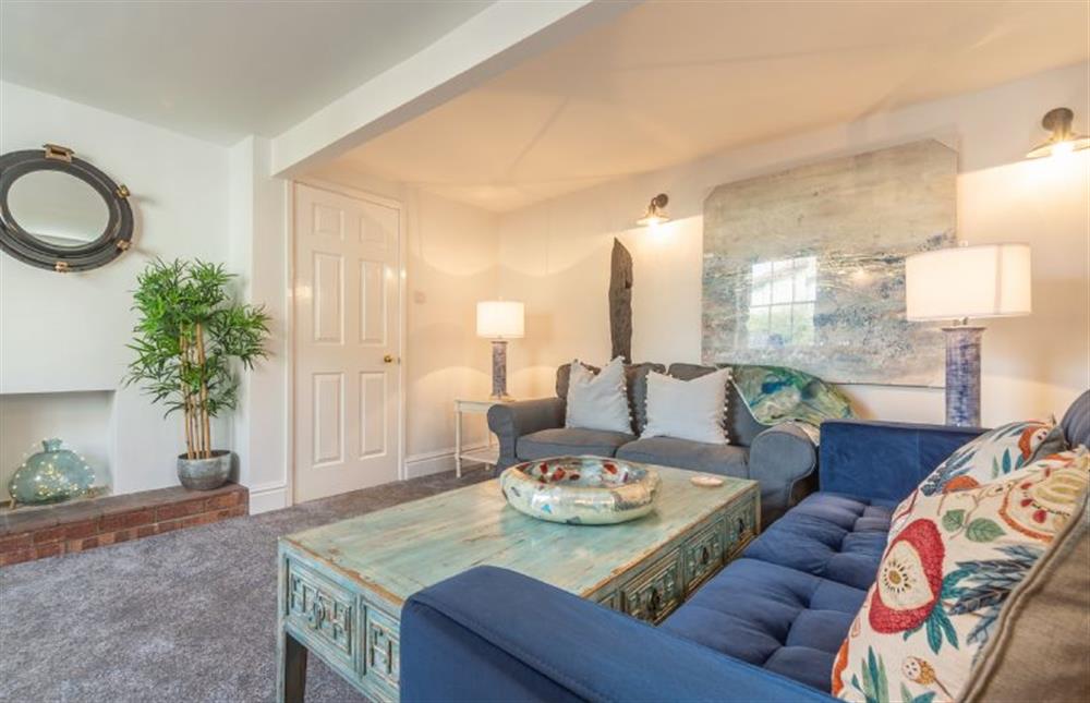 Ground floor: Sitting room with view of The Buttlands at Casamaria, Wells-next-the-Sea