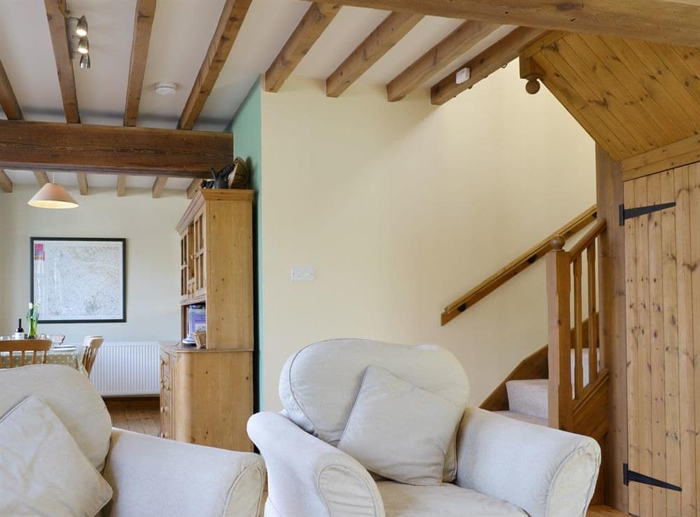 Exposed wood beams throughout the living areas at Cass Lodge in York, North Yorkshire
