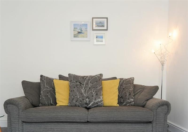 Relax in the living area at Castaway, Amble