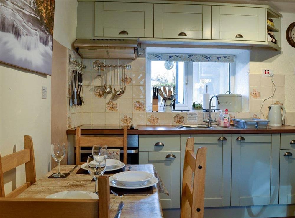 Well equipped kitchen/dining area at Castiel Cottage in Ysbyty Ifan, near Betws-y-Coed, Gwynedd