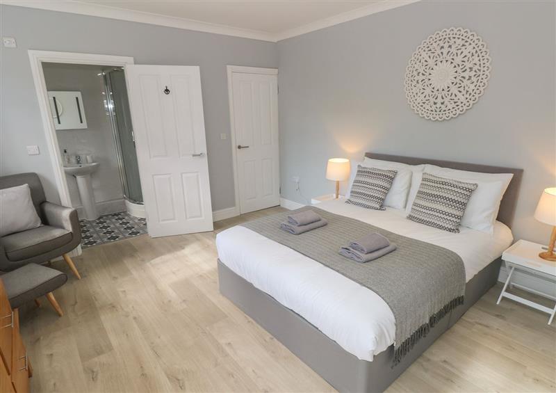 One of the bedrooms at Castle at The Hideaway, Tenby