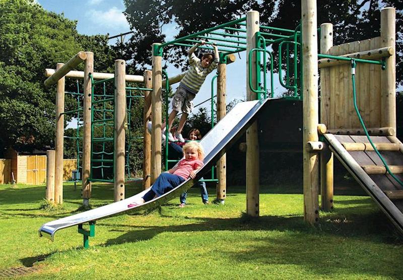 Children’s play area at Castle Brake Holiday Park in Devon, South West of England