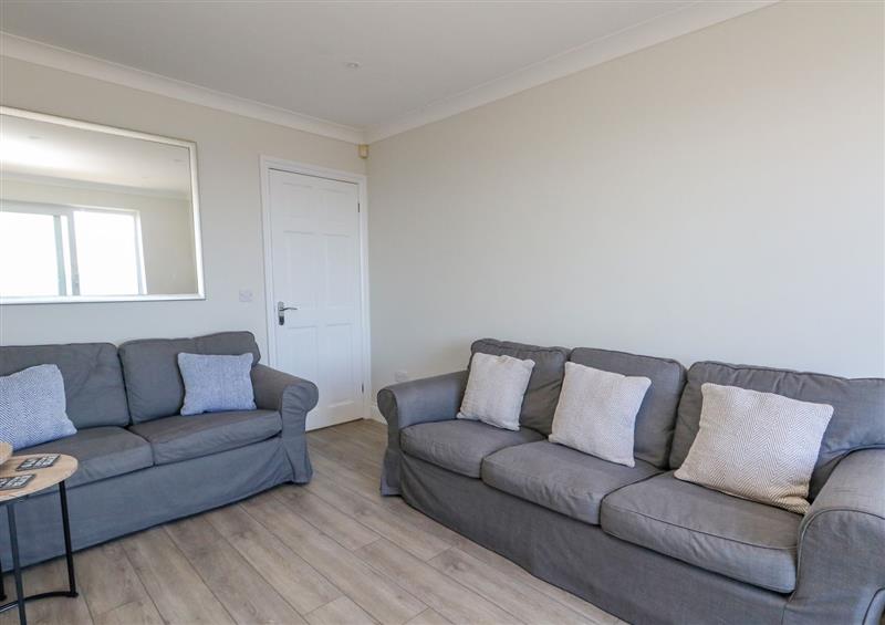 Enjoy the living room at Castle Cove Cottage, Weymouth