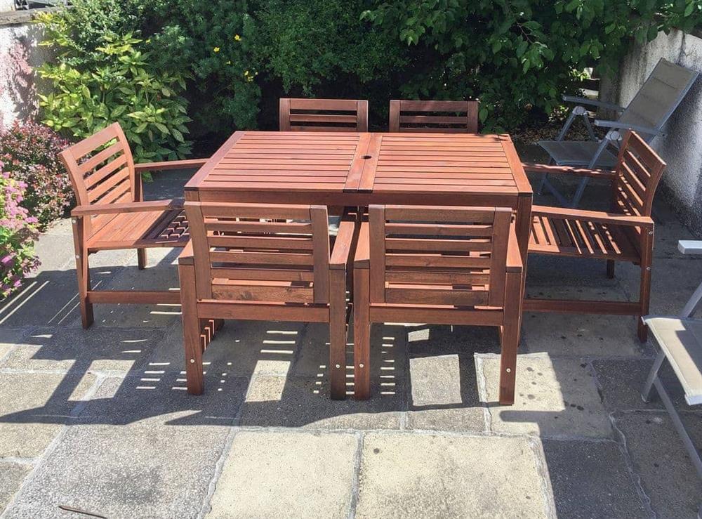 Delightful sunny patio with table and chairs at Castle Crag  in Keswick, Cumbria