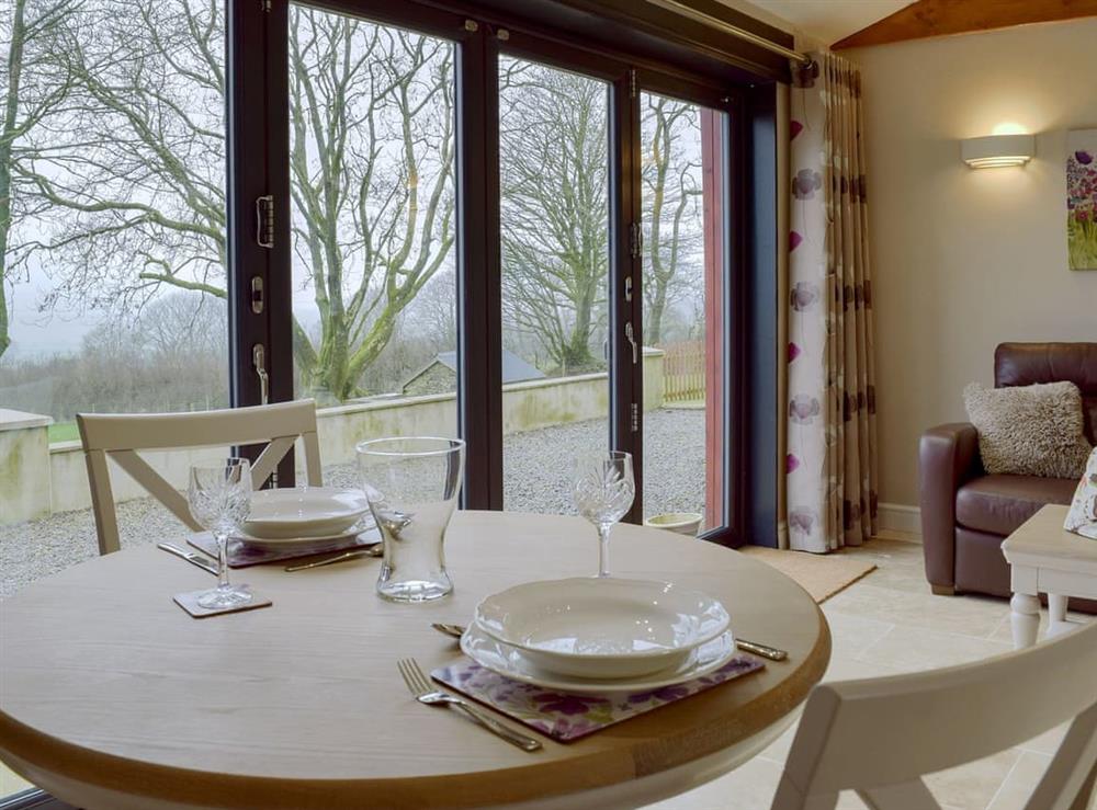 Charming dining area at Castle Farm in Tufton, near Haverfordwest, Dyfed