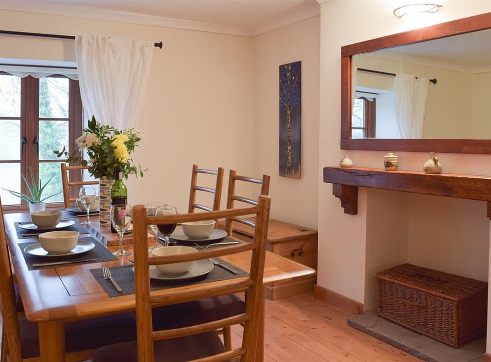 Charming dining room at Castle Hill Cottage in Llansteffan, near Carmarthen, Dyfed