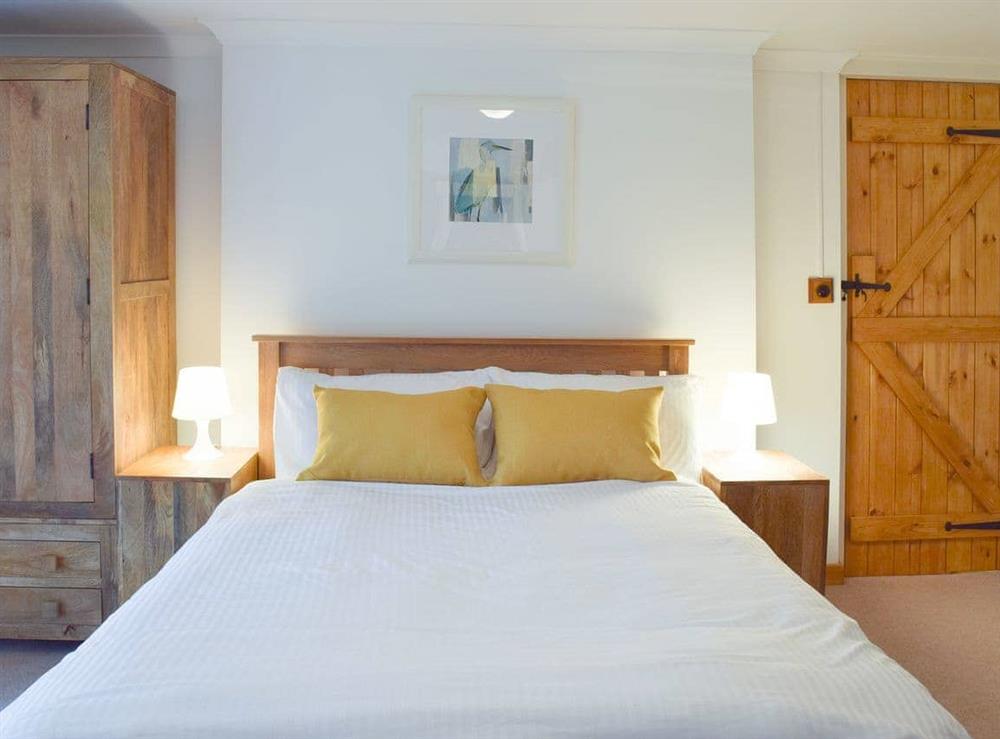 Comfortable double bedroom at Castle Hill Cottage in Llansteffan, near Carmarthen, Dyfed