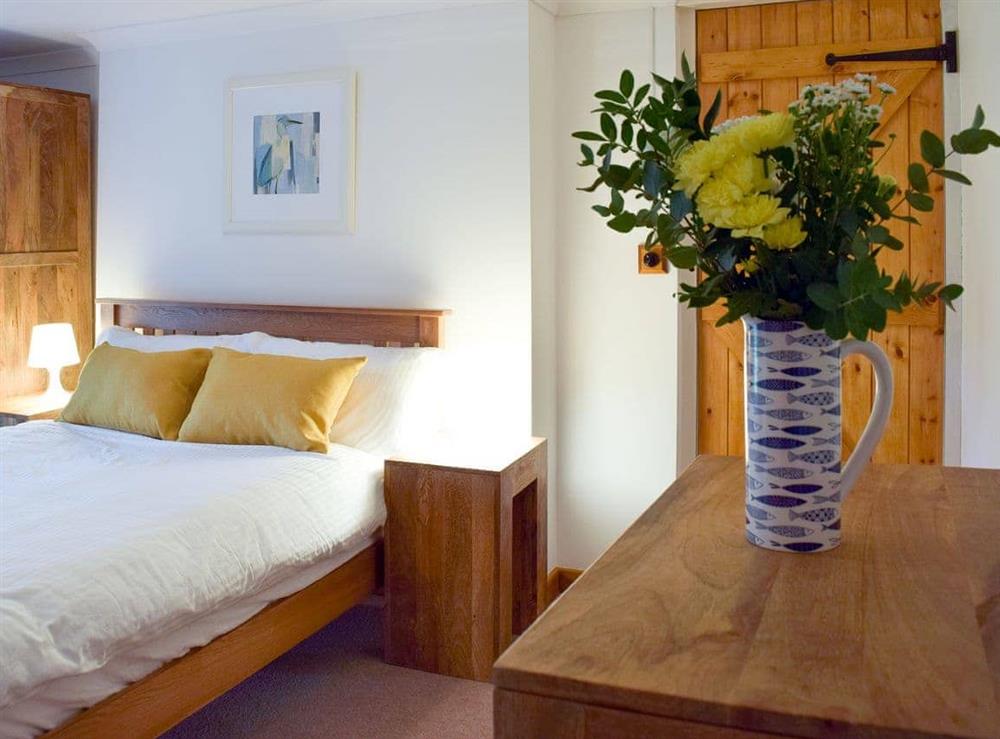 Lovely bedroom with double bed at Castle Hill Cottage in Llansteffan, near Carmarthen, Dyfed