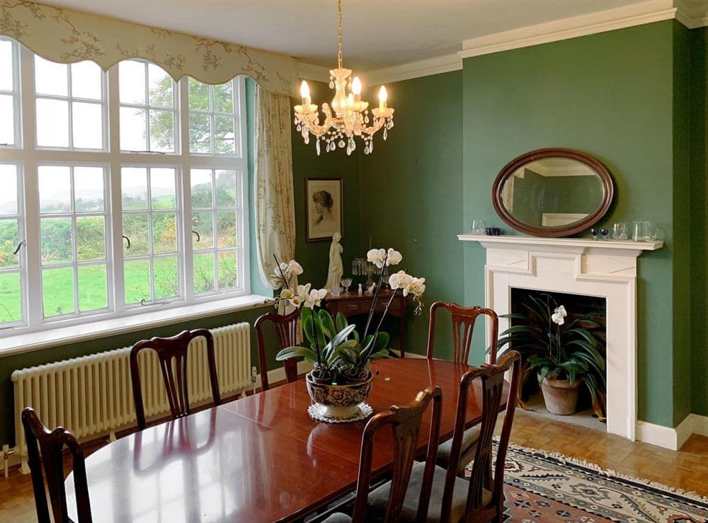 Attractive dining room at Castle Hill House in Sidbury, near Sidmouth, Devon